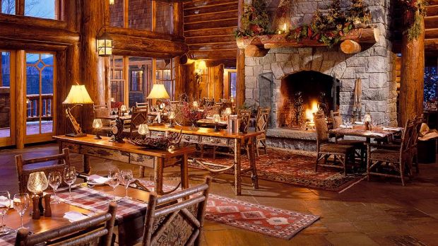 Whiteface Lodge Lake Placid lobby-dining-area-fireplace